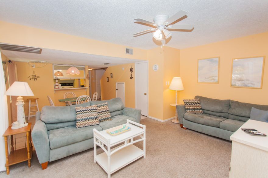 Come see this three-bedroom townhome with a large patio, living/dining/kitchen area downstairs with a half bath. The master bedroom has a private bath and patio.  The two other bedrooms share a full bath which is all upstairs.  The larger guest bedroom also has it's own private patio too.  The condo is a short, easy walk to beach.The community offers an array of amenities including four pools, a kiddie pool, mini-golf, tennis, shuffleboard, basketball hoop and clubhouse. Make sure to come see it before it's gone!