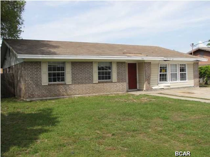 GREAT BUY on this 4 Bdr 2 Bth almost 1800 Sq Ft property. FORECLOSURE that has been cleaned out, but still needs some work. Great opportunity for Investor to fix-up and resell, or fix-up for Rental Property. This neighborhood rents well because of the Convenient Location to Gulf Coast College, FSU PC Campus, Beach, 23rd Street Businesses, etc. Could be a good candidate for FHA 203k Rehabilitation Financing for primary residence. Nice BackYard with Privacy Fencing and Alley access. Covered Concrete Patio off of Family Room. Garage has been converted into Den, but could easily convert back to Garage if desired. This is a very good opportunity to get a good buy on a Foreclosure.