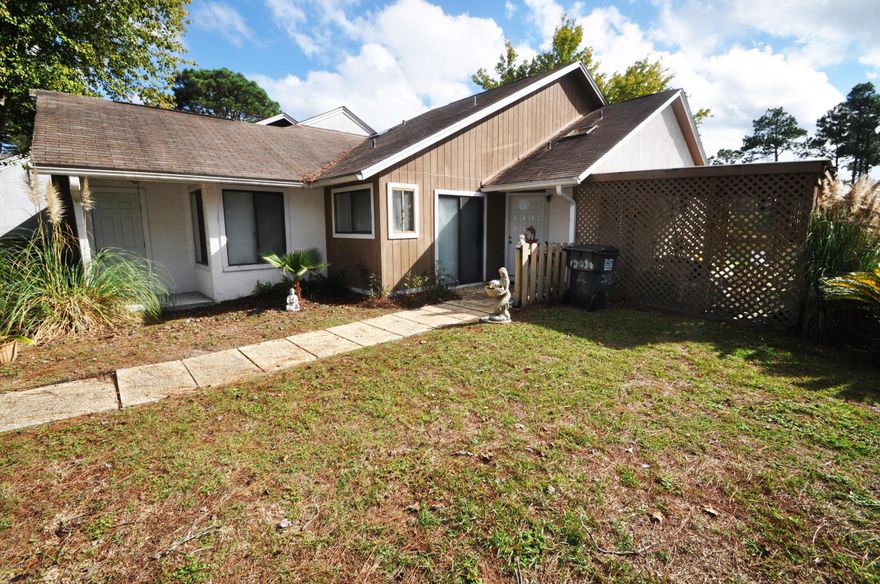 Nice 2 bedroom 2 bath waterfront townhouse close to Eastern Shipbuilding and Tyndall AFB. This home is kept very clean. USDA 100% financing is available for those that quailify. This would make an awesome rental or investment property. This home is PRICED TO SELL as seller is very motivated and piced it to show that..L@@k at the phots.. tiled floors.. huge sunroom..end unit so you have much more outside area then any other unit... dock on lake ...Roof is 11 years old...All Sizes are approximate please measure if important.