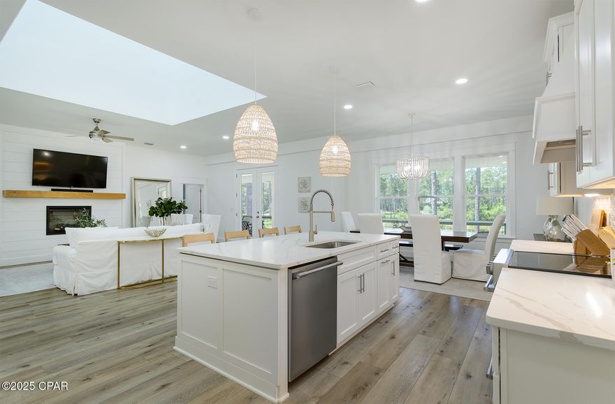 Custom 2,604 sq ft RiverCamps home located on 1.26- acres and on a pond. Built in 2023 this immaculate 4 bedroom, 3.5 bath home is open and bright, highlighted by the cupola that floods the open floor plan with natural light. There is so much to love about this home. A large covered front porch. An elevator shaft equipped with a lift making access to the main floor a breeze. Luxury vinyl plank flooring, quartz countertops, stainless steel appliances, shaker cabinets and a large walk-in pantry. Washer and dryer convey as does the electric sauna. There is a screened in porch that runs the length of the home with an electric fireplace for those cool evenings. Beneath the home you will find a 2-car garage, 1/2-bath and an enclosed mudroom with access to the lift. Drywalled bonus room for a future office, bedroom, extra storage or ??? 
Plenty of covered space for your golfcart and toys. 
This home is located in the gated, waterfront community of RiverCamps in Panama City Beach. Surrounded by 3 bodies of water, Crooked Creek the Intracoastal Waterway and West Bay there is direct access to Shell Island and the Gulf with a 30-minute boat ride. Owners enjoy a community boat ramp, dry boat storage and day use boat slips. New pool and pavilion opened just in time for the heat of summer. RiverCamps is a 1500 acre nature preserve. With less than 450 homesites on 500 acres and 1,000 acres committed to conservation. There are over 7 miles of connected trails and boardwalks perfect for hiking, biking, golfcart rides or taking in the sights of abundant wildlife. Truly unlike any other neighborhood in Panama City Beach. 10 miles from Pier Park and the white sandy beaches, 10 minutes from the NW Florida Beaches International Airport. Far from the traffic and crowds yet close to everything.
For the latest updates about the ongoing rebuild of amenities please call listing agent.