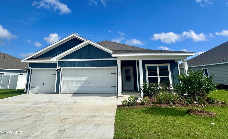 Discover exceptional living at 6564 Haskins Drive in the welcoming Phase IV of Liberty, Panama City, FL. This splendid single-family residence, known as the Madison floor plan, offers a fresh take on community living.

Boasting four bedrooms and three bathrooms, this home accommodates both comfort and privacy. The generous three-car garage and large covered front porch set the stage for a home that's both functional and inviting. Step through the long foyer and you'll find two cozy bedrooms with a shared bath, seamlessly blending privacy with accessibility.

The heart of the home is the spacious living area, complete with a central kitchen island, ample cabinetry, and a dining area that overlooks the backyard through to the covered back porch—a perfect setting for entertaining or serene relaxation. The primary bedroom is a haven of tranquility with trey ceilings, a luxurious ensuite featuring a separate shower, indulgent soak tub, and a sizeable closet.

This residence doesn't just impress with space—it shines with top-notch interior features like quartz countertops, EVP flooring in common and wet areas, and plush carpeting in each bedroom. The standard stainless steel appliance package adds a touch of elegance and convenience to your culinary adventures.

Smart Home Technology elevates this home into the future, with features like Kwikset Keyless Entry and a Qolsys touch panel that integrates control over lighting, thermostat, and home security.

Liberty community boasts a rich amenity center, diverse floor plans, and a sprawling landscape that's set to house almost 2,000 homes. It's a vibrant hub for families and community events. Just a 15-minute drive from Tyndall Air Force Base and a stone's throw from downtown Panama City, Liberty affords easy access to shopping, dining, schools, and the pristine shores of Panama City Beach. Welcome to 6564 Haskins Drive—a home that embodies comfort, connectivity, and the true spirit of community.