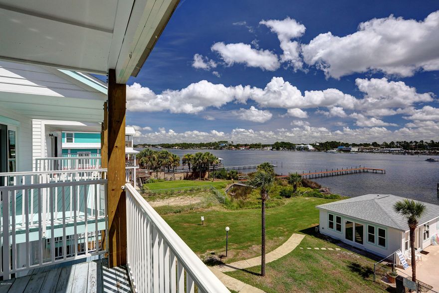 CURRENTLY  UNDER CONTRACT SELLER ACCEPTING BACKUP OFFERS  Recently renovated project from storm damage.NEW roof,hardIiboard siding, railings, paint, windows, doors and porthole  skylights, new support piling on water side.Only 57 unit project with pool & dock.Beautifull view of Grand Lagoon from private balcony on third floor..Close proximity to St Andrew State Park, public beaches, golfing,marinas,boat slips and storage, pontoon boat and jet ski rentals, charters & tourist attractions & fine dining,   Unit renovated  in LIKE  NEW  condition  Hunter ceiling fans, light fixtures,custom,white shaker style cabinets quartz countertop,,splashback tile, stainless steel appliances,, deep tub, subway tile,  luxury  vinyl.  plank flooing  , full wall mirrors. Owners may have pets. . Room size measurements approximate.  Buyer should measure for exact size. Perfect location for vacation home, resort living or investment property.  Prime beach location with quiet setting on Grand Lagoon.
