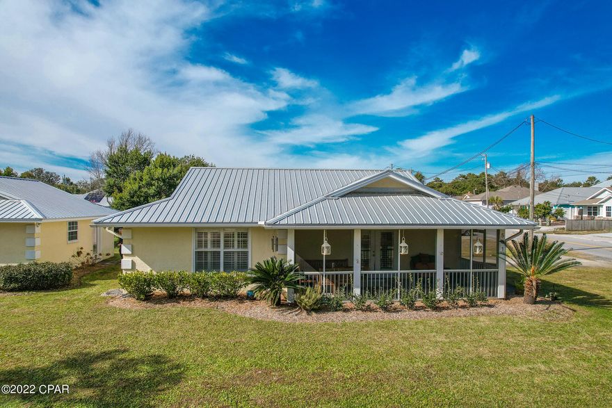 Love this home  located on the far West-End of Panama City Beach in the sought-after community of Riviera Beach. This beach cottage is perfect for a short-term rental or primary residence. It has excellent features, including a large screened-in porch, a large corner lot, sprinkler system, hurricane shutters, & a well. A separate bonus 24x24 heated & cooled building can be renovated into an additional rental, mother-in-law quarters, or an ideal space for a man cave. This golf cart-friendly area of Riviera Beach has a wonderful sense of community with its own Facebook page, sunset gatherings, holiday festivities, & more. The location is fantastic! Close to Pier Park (shopping, movie theater, restaurants), Carillon Beach, the 30A corridor. Charming home. Awesome location! Come see!