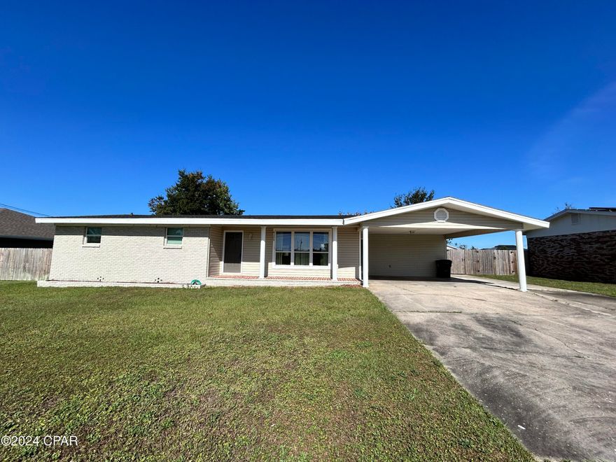 This charming 3 bedroom, 2 bathroom brick home located in Panama City, FL. This cozy abode features a covered carport area, perfect for keeping your vehicle protected from the elements. Inside, you'll find luxury vinyl plank flooring throughout, giving the space a modern and sleek look. The stainless steel appliances in the kitchen add a touch of elegance, while the laundry room provides convenience. The master bathroom boasts a walk-in shower for a spa-like experience. Step outside to the fenced backyard, complete with a storage shed for all your outdoor storage needs. Don't miss out on the opportunity to make this house your home!