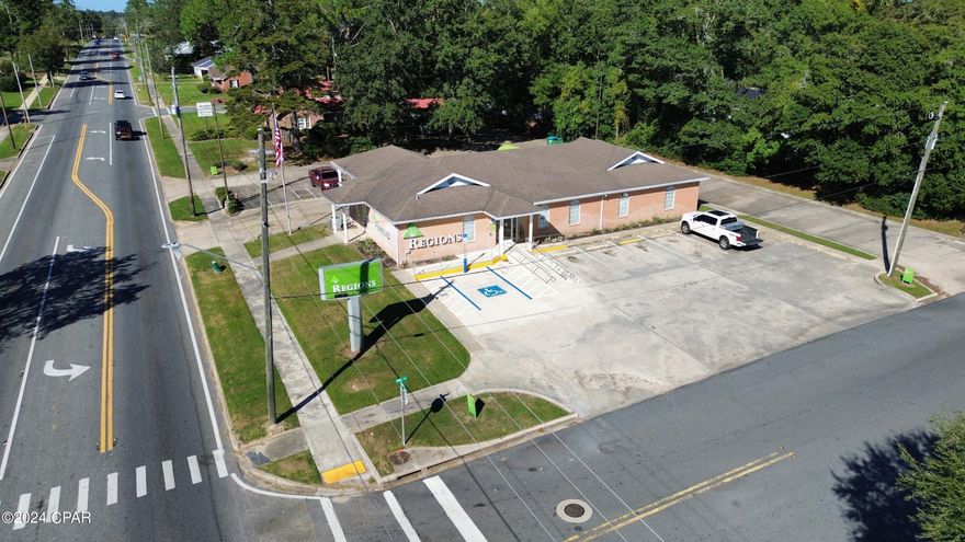 This +/- 1,924 sf single-tenant building is located on a corner lot in the heart of Bonifay's business district. The building has 2 offices, a break room, and 2 drive-through lanes. Just a block from Holmes County Tax Collector's office, on the corner of North Waukesha Street and East Iowa Ave. 2.3 miles north of Interstate 10 and .5 miles north of Highway 90, this office building is in the heart of economic activity in Holmes County.