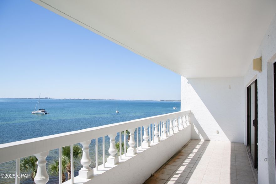 Seller is MOTIVATED!!!
This is an EXECUTIVE LEVEL opportunity with unbelievable terms. The front office has structured a deal you can't refuse: SELLER FINANCING at a phenomenal 5% INTEREST RATE—a power play that instantly saves you money! With only 20% DOWN and a 30-year amortized schedule (8-year balloon), the path to ownership is clear. THIS IS THE MOMENT. ACT NOW!

Welcome to the highly sought-after, non-rental Cove Condominiums, where this impeccably renovated two-bedroom, two-bath unit is ready to make its debut. Tired of the rigorous maintenance of a single-family home? Transition seamlessly into a life defined by luxury and leisure.

The breathtaking, full-span bay views are the defining feature, stretching from the expansive living room to the serene master suite, both offering direct balcony access. The interior is a masterclass in modern design, featuring premium finishes like granite, stainless steel, new tile and carpet, and a show-stopping marble walk-in shower in the master bath. Ample storage—including a generous kitchen pantry, walk-in closet, and three hallway storage rooms—ensures a clutter-free environment.

Complete the experience with easy access to the private community pool and dock. This is more than a home; it's a CHAMPIONSHIP LIFESTYLE.

Don't wait for the final whistle—this listing won't last!