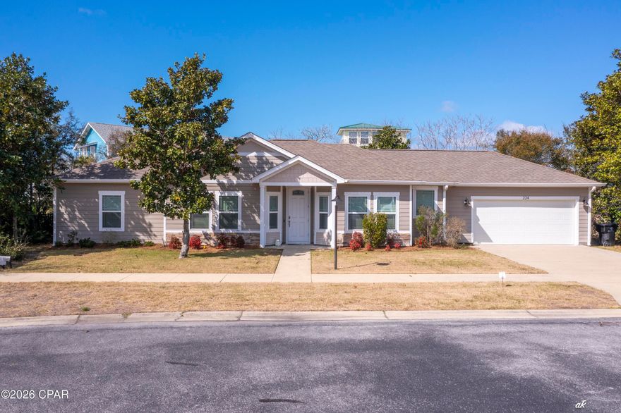 Welcome to Ocean Mist, one of Panama City Beach's best kept secrets. This quiet, gated neighborhood features twenty-four craftsman-style homes, a secluded community swimming pool, a shaded pergola for gatherings, sidewalks for walking, and underground utilities which enhance its charm. The home features a single-level open floor plan with a split bedroom layout, custom cabinets, granite countertops, breakfast bar, stainless steel appliances, crown molding, and a laundry room. The primary suite includes a spacious bedroom, bathroom with custom tile shower, double vanity, and a large walk-in closet. Additional upgrades to the property include wood-grain porcelain tile flooring, sprinkler system, rain gutters, and hurricane shutters. The home is move in ready and can be sold furnished (with minor exclusions). This property is conveniently located on the cul-de-sac next door to the community swimming pool, within walking distance or a short golf cart ride to the world's most beautiful beaches, and just minutes from Pier Park, various restaurants, golf courses, and shopping areas. The quarterly Homeowners Association (HOA) fee includes weekly trash service, maintenance of common areas, access to the community pool and gated access to the community. This meticulously maintained second home, presents a unique opportunity for you to acquire your personal piece of paradise - schedule your showing today! All information is approximate and should be verified by buyer if important.