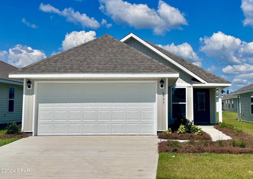 Welcome to Liberty. This home is ready for quick move in. This Celeste floor plan is located at 6597 Canley Court. Featuring 3-bedrooms 2 bath, 1427 square feet, this home has an open concept floor plan. Interior features of this home include EVP flooring in living and wet area, granite countertops, stainless kitchen appliances which include a stove, microwave and dishwasher. This home is a must see. Like all homes in Liberty, the Celeste includes a Home is Connected smart home technology package which allows you to control your home with your smart device while near or away. Liberty neighborhood is conveniently located in beautiful Panama City off Star Avenue near 231. Located just 25 minutes from Tyndall Airforce Base, 20 minutes to hospitals, and less than 15 minutes to shopping, restaurants, and grocery stores you will be amazed at the convenience once you enter the winding entrance to this beautiful sanctuary. Liberty, D.R. Horton's premier new lifestyle community, offers a 7,500 square foot community center with full gym, wellness rooms and much more. Additionally, behind the community center is a water wonderland with resort style pool, splash pads, and an outdoor grilling kitchen with seating. Homes are subject to prior sale or rent. Home and community information, association fees (if any), included features, terms, availability and amenities, are subject to change at any time without notice or obligation. Drawings, pictures, photographs, videos, square footages, floor plans, elevations, features, colors and sizes are for illustration purposes only and will vary from the homes as built. Landscaping and furnishings may be decorator items not included in the purchase price and may not be available.