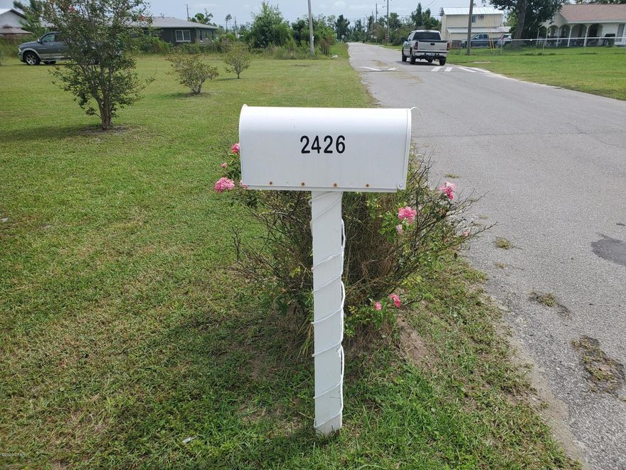 WELCOME HOME! Completely Renovated Florida Cottage. 15x35 Like New Detached Garage with 2 Roll Up Doors and Painted Floor. RV and or Boat Shed. All of this sits on almost 2 Acres. Level Lot with Green grass. This cute home had a New Roof up to code in 2018. The AC is 2018. Brand New Vinyl siding and trim along with New Double Pane Windows. Sprinkler System has New Pump. Once inside the Foyer to the left a Huge Family Room.

Walk through to the Formal Dinning/Formal Living Room. Kitchen is cute as a button with granite countertops, backsplash, Built in the wall Double Stainless Refrigerator, Glass Top Stove with Stainless Vent Hood. Plenty of cabinet Space along with glass front for your fine china. Off the kitchen is the LARGE Master bedroom and Bath. Master has Large Walk In Closet complete with Crown Molding. There is Crown Molding in almost every room. Vinyl Plank Flooring in Kitchen and Master Bedroom. Other Three Bedrooms Formal Dinning and Formal Living have Beautifully Refinished Hard Wood Flooring. The Large Living Room has Carpet. Wall Colors are both tasteful and Florida worthy. Laundry room off Master Bedroom for convenience. 
CAR FOLK, THIS GARAGE IS FOR YOU! Strong Steel frame, metal Roof and Siding. Garage like new complete with Painted Floor and 2 Roll up doors. Also, outside a cement Pad. Most of the Acreage is fenced.
THIS IS A MUST SEE! WON'T LAST LONG! Buyer and Buyers agent to verify All Dimensions and any information deemed important.
The Yard Building Does Not Convey. To be removed!