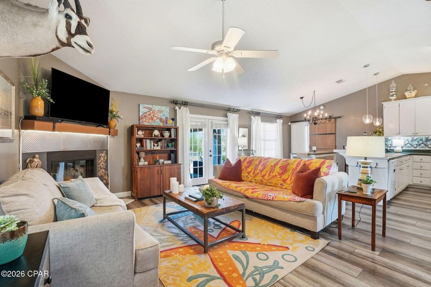 Welcome to your beautifully renovated 3-bedroom, 2-bathroom country oasis tucked away on a quiet waterfront lot. With minimal traffic and a golf cart-friendly neighborhood, this country gem offers the perfect blend of privacy, convenience, and lifestyle. Step inside to discover a spacious open-concept main living area filled with natural light. A lovely fireplace serves as the focal point of the living room, flanked by French doors that lead directly out to a large deck overlooking the pond. In the dining and kitchen area, you'll find a beautiful backsplash, spacious pantry, and convenient breakfast bar--perfect for simple meals or a buffet station when entertaining family and friends. The home has been thoughtfully updated from top to bottom featuring: New roof, air conditioner, siding, LVP flooring, fresh interior paint, designer backsplash, and updated lighting fixtures. The outdoor space is just as impressive! Enjoy spending time on your wonderful open deck, spacious back yard, or feeding the fish and turtles down by the pond. There is even a garden area and a citrus tree for those who love to grow their own produce plus a spacious new shed and lean-to that can be used as a workshop, man cave, she shed, or extra storage. Whether hosting summer gatherings or enjoying a quiet evening under the stars, this backyard truly delivers. Additional highlights include a large Primary Suite w/ a Jacuzzi tub and walk-in closet, a double garage, a sprinkler system, a Culligan water filtration system, a corner lot location, and a split bedroom layout offering both comfort and functionality to everyday living. Like to fish? There are 2 boat ramps less than a half mile away. Launch your boat, jet ski, or kayak into Deerpoint Lake and enjoy some of our area's best freshwater fishing! Homes like this -- updated, move-in ready, no HOA, and no flood insurance required -- don't come along very often. CALL TODAY FOR MORE INFORMATION!