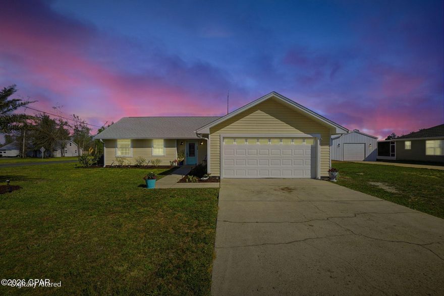 Welcome to your beautifully renovated 3-bedroom, 2-bathroom country oasis tucked away on a quiet waterfront lot. With minimal traffic and a golf cart-friendly neighborhood, this country gem offers the perfect blend of privacy, convenience, and lifestyle. Step inside to discover a spacious open-concept main living area filled with natural light. A lovely fireplace serves as the focal point of the living room, flanked by French doors that lead directly out to a large deck overlooking the pond. In the dining and kitchen area, you'll find a beautiful backsplash, spacious pantry, and convenient breakfast bar--perfect for simple meals or a buffet station when entertaining family and friends. The home has been thoughtfully updated from top to bottom featuring: New roof, air conditioner, siding, LVP flooring, fresh interior paint, designer backsplash, and updated lighting fixtures. The outdoor space is just as impressive! Enjoy spending time on your wonderful open deck, spacious back yard, or feeding the fish and turtles down by the pond. There is even a garden area and a citrus tree for those who love to grow their own produce plus a spacious new shed and lean-to that can be used as a workshop, man cave, she shed, or extra storage. Whether hosting summer gatherings or enjoying a quiet evening under the stars, this backyard truly delivers. Additional highlights include a large Primary Suite w/ a Jacuzzi tub and walk-in closet, a double garage, a sprinkler system, a Culligan water filtration system, a corner lot location, and a split bedroom layout offering both comfort and functionality to everyday living. Like to fish? There are 2 boat ramps less than a half mile away. Launch your boat, jet ski, or kayak into Deerpoint Lake and enjoy some of our area's best freshwater fishing! Homes like this -- updated, move-in ready, no HOA, and no flood insurance required -- don't come along very often. CALL TODAY FOR MORE INFORMATION!