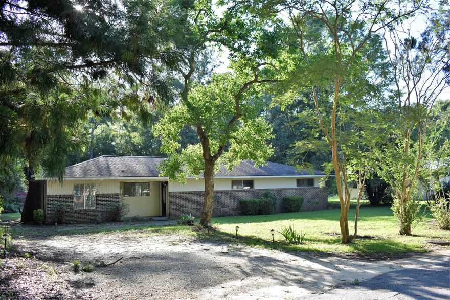 This attractive home is conveniently located inside the city limits at the end of a dead end street adjacent to farm land on one side.  It would make a perfect starter or retirement home.  The open concept living and kitchen area provides a spacious area for family gatherings. Home has a nice backyard with an outbuilding for extra storage.