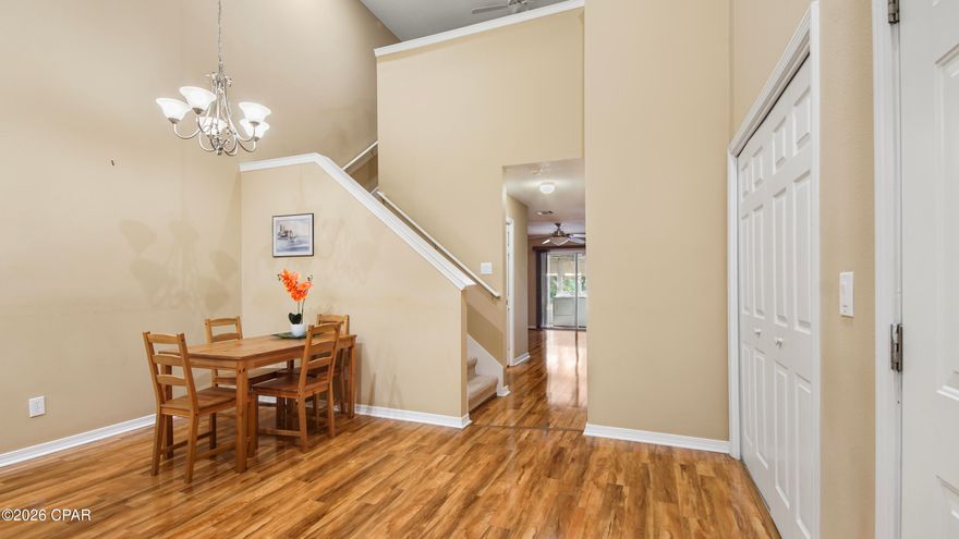 Located in the desirable Palmetto Trace community, this 3-bedroom, 2.5-bath home offers an ideal setting just minutes from Pier Park and the beaches of Panama City Beach. The main level features an open living and dining area connected to an updated kitchen, creating a bright and comfortable space for everyday living and entertaining. The primary bedroom is conveniently located on the first floor and includes its own bath and walk-in closet. Upstairs are two additional bedrooms, a versatile loft-style seating area, and a separate nook that can easily serve as a study or workspace. An enclosed, heated and cooled patio extends the living space year-round, while the private backyard offers a relaxed outdoor retreat. Additional features include a one-car garage with driveway parking, washer and dryer, and central air. Residents enjoy two community pools, sidewalks, and quick access to Frank Brown Park, schools, medical facilities, and daily conveniences. Available now, this move-in-ready home provides a quiet, family-friendly coastal lifestyle in one of Panama City Beach's most convenient locations—schedule your viewing today.