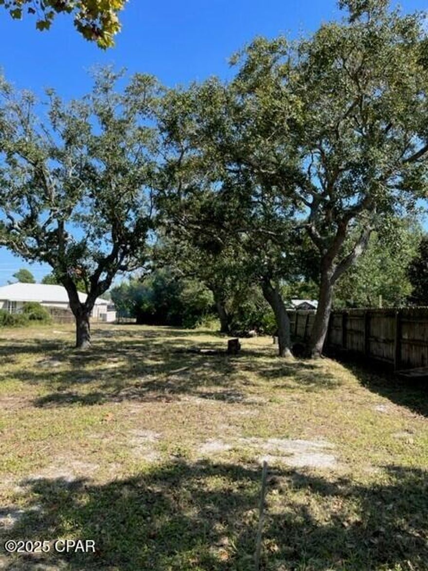Looking for the perfect spot to build your dream home or invest in a rental property? This versatile lot is zoned for single-family or duplex, giving you options! Located less than a mile from the beach in desirable Flood Zone X, this property is ready for your plans. It comes with an existing survey, electric on site, plus a private well and septic system already installed. Don't miss this opportunity to own a prime piece of real estate near the coast!