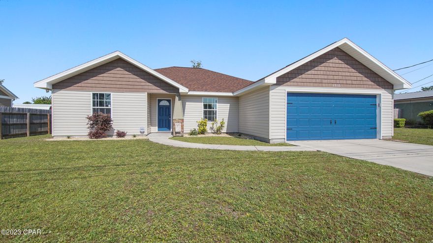 CURRENTLY UNDER CONTRACT, SELLER WILL CONSIDER BACKUP OFFERS. Beautiful and exceptionally maintained home in the very heart of Lynn Haven! Flood Zone X. When you walk in, you're greeted with a foyer leading into the open concept living room, kitchen, and dining room. The primary bedroom boasts lots of space and other 2 bedrooms are well sized and ready for your family to move in! The entire lot has a sprinkler system installed. The backyard offers a covered patio, new privacy fence and  fabulous outdoor chimney, perfect for your summer entertainment! Roof replaced in 2019, brand new plush carpet in 2020, and primary and secondary bathrooms have been updated as of 2020. This home is a must see and as an added bonus, is walking distance to Cain Griffin Park. Call your favorite realtor for a private showing today!