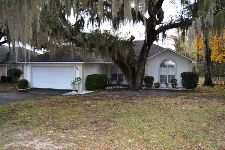 Super clean, ready to move in home located in a quiet neighborhood close to Tyndall AFB, shopping, restaurants and great schools.  This 3 bedroom, 2 bath home is located on a private cul-de-sac, one a small lake with lakefrontage.  The interior of the home features a large great room with a corner fireplace, an eat in kitchen with a full appliance package and TONS of counter top and cabinet space.  The master bedroom with access to the back deck is split from bedrooms 2 and 3 and is one of the largest masters you will find in a home like this.  The master bath has double vanities, a walkin closet, private comode, and a tub/shower combo.  The remaining bedrooms share a bath.  The outside of the home is very appealing with a grand oak tree in the front and a large waterfront yard in the back A new wooded deck overlooks the park like setting in the back yard.  The home has a newer roof, A/C , deck and light fixtures.  Fresh paint in kitchen.  This home is not a driveby, call your Realtor today for a private showing.  Motivated seller!