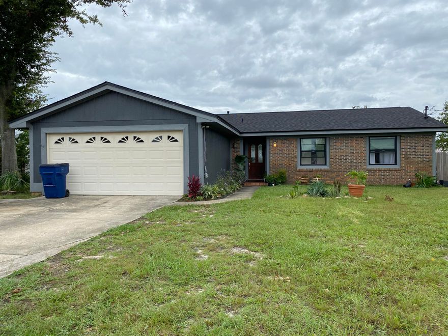 CURRENTLY UNDER CONTRACT, SELLER ACCEPTING BACKUP OFFERS - Great home centrally located in Panama City in King Estates/Forest Park area. The 3 bedroom, 2 bathroom plus bonus room home has a comfortable open floor plan. Recent updates include new roof, new fence, both bathrooms remodeled, new flooring and the exterior painted.  There are new electrical outlets with usb ports for device charging.  There are outdoor weatherproof electrical outlets in 5 spots to accommodate security cameras.  A new Nest Thermostat. New fan/light fixture in bonus room and new fan/light in master bedroom with bluetooth speaker.    Huge fenced in backyard.  Call to see today!