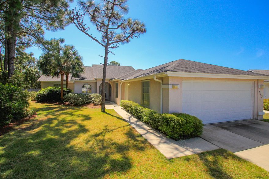 In addition to being an IMMACULATELY KEPT, this one-owner home has more square footage AND it is on a LARGER LOT than the typical patio home in THE GLADES at HOMBRE GOLF CLUB. In addition to the three bedroom, 2 bath spaces, the 15x20 BONUS ROOM offers flexible space for an IN-LAW SUITE etc with plumbing in place for the third bathroom. Recent upgrades include roof in 2014, HVAC 2013, engineered hardwood flooring 2014, and water heater 2014. A SEE-THROUGH FIREPLACE separates living room and master bedroom. A covered patio off the main living area offers peaceful POND VIEWS along with views of a VERY GENEROUS BACK YARD that is the IDEAL SETTING for your added screen-covered pool. Nearby are shopping, dining, entertainment, and the beautiful SUGAR SHORE of our renowned BEACHES. Come to PLAY!