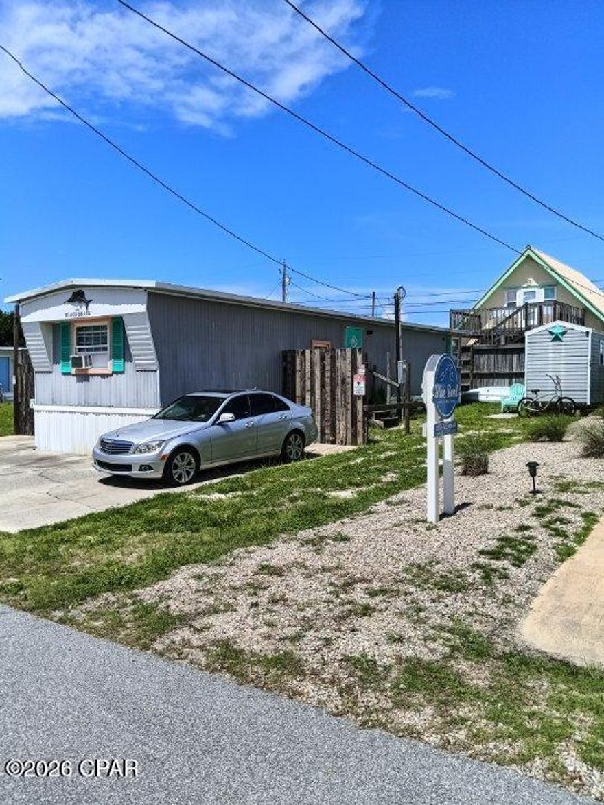 Located in the highly desirable Laguna Beach area of Panama City Beach, this property offers a fantastic opportunity to own an affordable beach getaway just under two blocks from the Gulf of America. Whether you're looking for a primary residence, second home, or potential vacation rental investment, this property offers flexibility and location.

Enjoy being just minutes from Pier Park, Frank Brown Park, and the shops and restaurants along Scenic Highway 30A. Thomas Donut & Snack Shop is within walking distance, making this location ideal for enjoying the laid-back beach lifestyle Laguna Beach is known for.

No HOA. Located in unincorporated Bay County. Owner financing may be considered with $75,000 down, payments of $2,000 per month at 7% interest, and a 4-year balloon. Buyers to verify all measurements, zoning, short-term rental requirements, and any information deemed important.