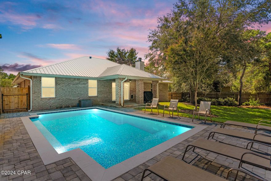 Nestled on an oversized lot, this single-level brick home in Dune Allen offers the perfect blend of coastal charm and modern convenience, less than 1 mile from pristine beaches of South Walton. Located just a short walk away from Santa Rosa Beach Golf Club and minutes from premier dining and shopping, this property is ideal for primary residence, vacation home, or high-demand rental investment. Inside, enjoy 4 generous bedrooms, one of which would be ideal for a home office or den, plus 2 full bathrooms. A cozy fireplace adds warmth, while a 2020-installed 20kW generator ensures peace of mind. The private backyard oasis features a sparkling inground pool and covered patio, perfect for relaxation or entertaining. If you're looking for your slice of paradise, you just found it!
With a 2-car garage, ample storage, and no HOA fees, this home offers unmatched freedom and versatility in a prime location.

Don't miss this rare opportunity to own a slice of coastal paradise with endless potential. Schedule a showing today!