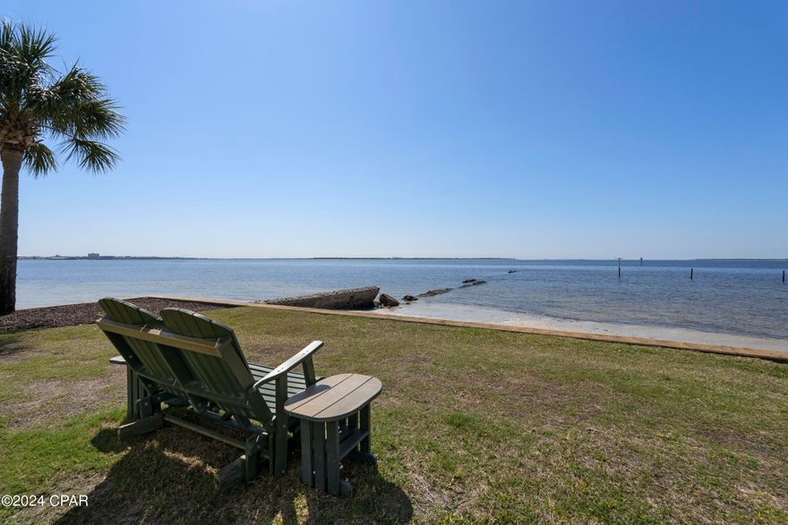 Welcome to the vibrant waterfront community of Landmark on St. Andrews Bay! This 1-bedroom, 1-bath ground floor condo unit offers the epitome of coastal living, nestled in a community along the sparkling waters of St. Andrews Bay. As you step inside, you're greeted by an open floor plan with newly installed, easy-care LVP flooring and natural lighting that floods in from the french doors that lead out to the open outdoor patio. This unit offers a spacious kitchen with ample storage and counter space with a breakfast bar overlooking the living room, adding to the open and airy flow throughout.

Prepare to indulge in the ultimate coastal lifestyle with all this community has to offer, including private boat slips, beach access, a fitness center, and 2 freshly painted pools, one overlooking the bay. The entertainment options are limitless with a clubhouse and pavilion featuring a big screen TV, 2 grills and multiple picnic areas, perfect for hosting gatherings with friends and family. When you're ready to explore beyond the community, take a short stroll or bike ride to the nearby shops and restaurants in either the popular historic downtown St. Andrews or the newly revived Downtown Panama City.  

Make this remarkable unit your own and live in a community you'll never want to leave.