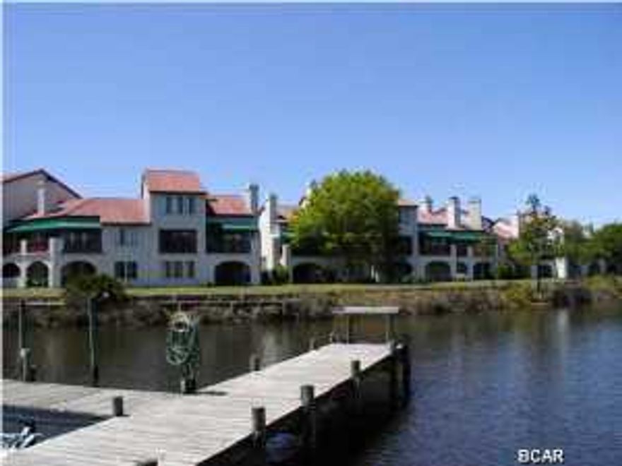 BOATS ARE WELCOME! After a long day on the beach, retreat to this quiet 2 bedroom (one is a large loft), 2 full bath 2nd story condo with a private balcony overlooking the Grand Lagoon. St. Thomas Square, also known as The Villas of St. Thomas, features a boat dock, swimming pool, tennis courts and sauna. Located in the heart of Panama City Beach, it is a short distance to Florida Gulf beaches, arcades, rides and restaurants/night clubs including Hammerhead Fred's, Spinnaker and Club La Vela. Public beach access is located across Thomas Drive and public parking spaces are provided at the entry point. Golf is within a mile. This updated second floor unit features a main floor bedroom with a queen bed and a loft/bedroom with 2 full-sized beds. The sofa opens to an additional queen-sized