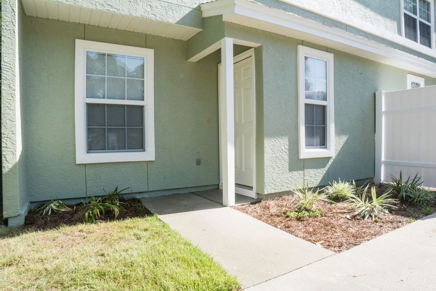 Two Bedroom Two Bath Townhome style duplex. Freshly painted with new carpet and LED lights throughout. Tile in the living room, dining room, kitchen and both bathrooms. Carpet on the stairs and both bedrooms. Washer and dryer hooks ups upstairs. Large partially fenced shared back yard. One year lease and $1095 security deposit required as well as a credit check (minimum 600 credit score) One dog with breed restrictions will be considered on a case by case bases with a non-refundable $250 pet deposit and an increase of $25 in monthly rent. No cats.