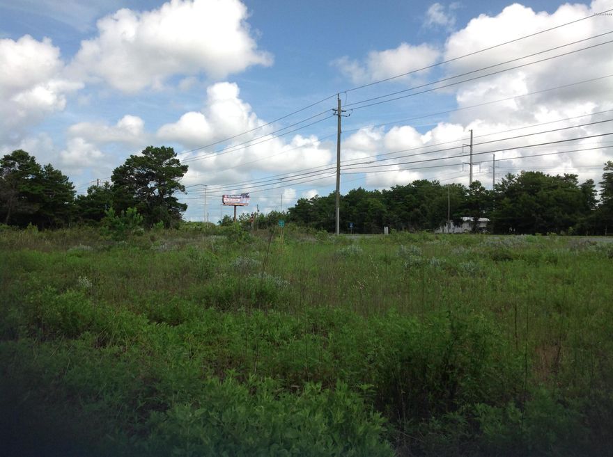 Prime Commercial property on Panama City Beach Parkway. Located only three blocks from The World's Most Beautiful Beaches. A great business opportunity lies in wait on this property. A great feature of this lot is that it corners on two streets; 14th and 15th Street.Only 3.5 miles from Pier Park, 6 miles from Rosemary Beach,+/-240 feet of road frontage on US98(Panama City Beach Parkway). Lot depth+/- 100 feet.Also included is a 33 x 120 Residential lot for other purposes.  18,000 cars per day and growing. Dairy Queen, just opened down the street.New Sleep Inn to be built , just a little over a mile west of here.