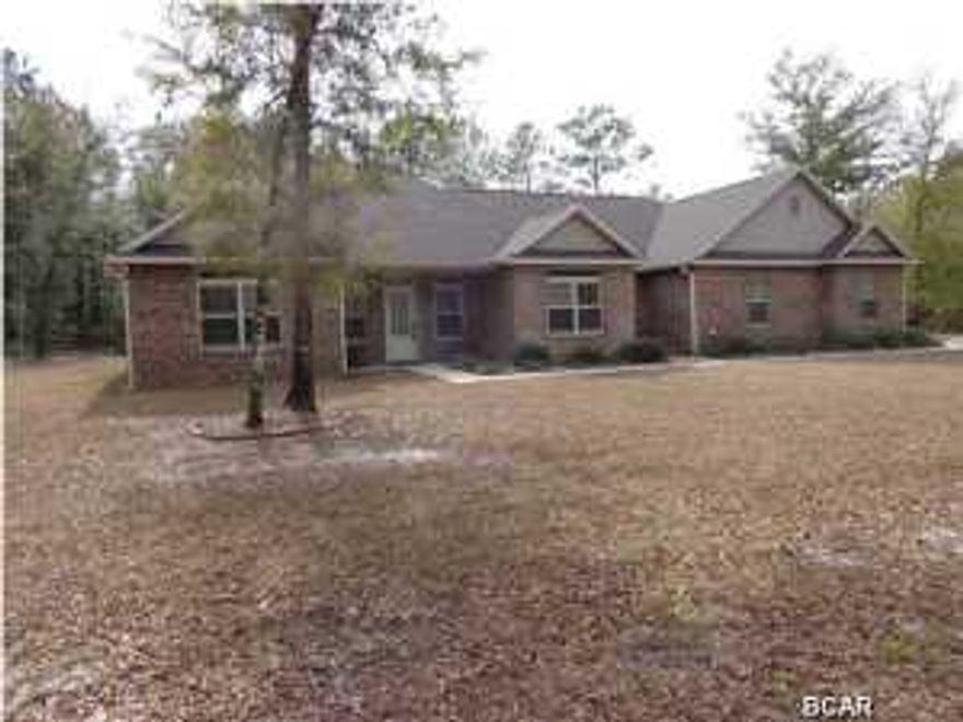 Custom built Southport brick home in Cedar Creek Chase. Interior features Mowhawk hardwood floors throughout, wood burning fireplace in large living room with crown molding and 10' ceilings. Kitchen floors tiled, solid surface (Corian) counter tops, stainless steel appliances and custom maple cabinets. Breakfast area overlooks back patio and yard. Formal dining room attached to kitchen. Split floor plan; master bedroom with tray ceiling and recessed lighting. Master bath features tile flooring, separate garden tub and fully tiled shower with glass door and rainfall shower head, double vanity, private water closet, walk in closet with built in storage. Additional bedrooms with 9'ceilings, large closets, shared hallway bathroom with double vanity. All doors and windows are