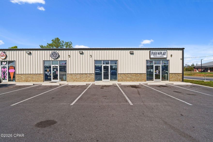 Maximize your business visibility in this brand-new, 1,075 sq. ft. commercial unit. Ideally located at the high-traffic corner of Transmitter Road and 11th Street, this metal-construction flex building offers a blank canvas suitable for retail, professional office, or light industrial use. Be the first to occupy this space, delivered in shell condition and featuring a private restroom, allowing for a fully customized tenant build out. Whether you need partitioned offices, open workspace, or a boutique retail layout, this unit provides the flexibility to design the space to fit your exact business needs. The property is located directly across from the new Springfield City Hall, providing consistent daily administrative and strong visibility. Positioned at a prime corner intersection across from a gas station and established apartment complexes, the location offers excellent exposure and easy customer access with convenient ingress/egress. The building includes modern firewalls and up-to-code fire safety systems, offering both safety and peace of mind. In the growing Panama City market, new construction flex space with immediate proximity to municipal hubs is rare. This unit combines the professional image of a new construction with the logistical advantages of a high-visibility corner location. An excellent opportunity for businesses looking to establish or expand in a rapidly growing area.