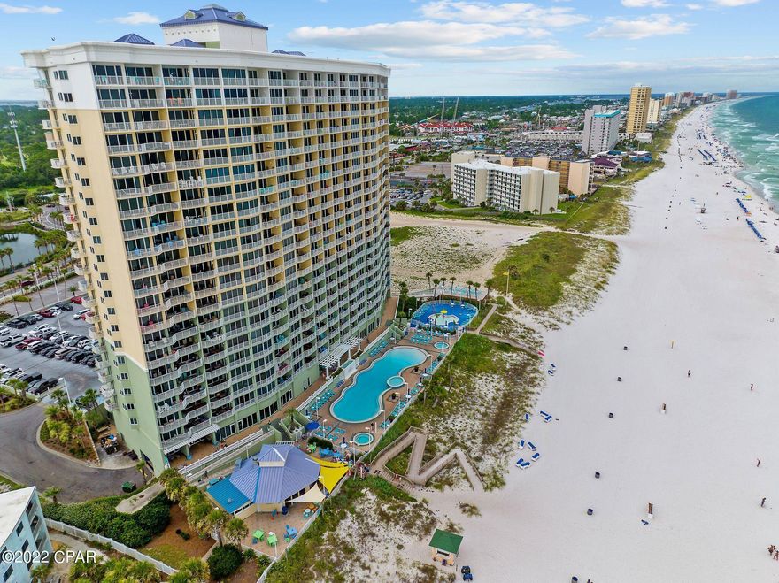 Boardwalk Beach Resort end unit with EFFICIENCY UNIT and bunk room. The resort is a popular destination for visitors with its expansive zero entry pool, tiki bar restaurant, interactive water park area for kids, and convenient location to restaurants and entertainment. This 3-bedroom plus bunk room unit features a kitchen with stainless steel appliances, efficiency unit with its own private kitchenette and balcony and expansive views of Gulf. The property also features a fitness center, covered garaged parking, 2 hot tubs, and arcade room. *Property is currently successfully managed by Royal American, and they would love the opportunity to continue to manage them.*