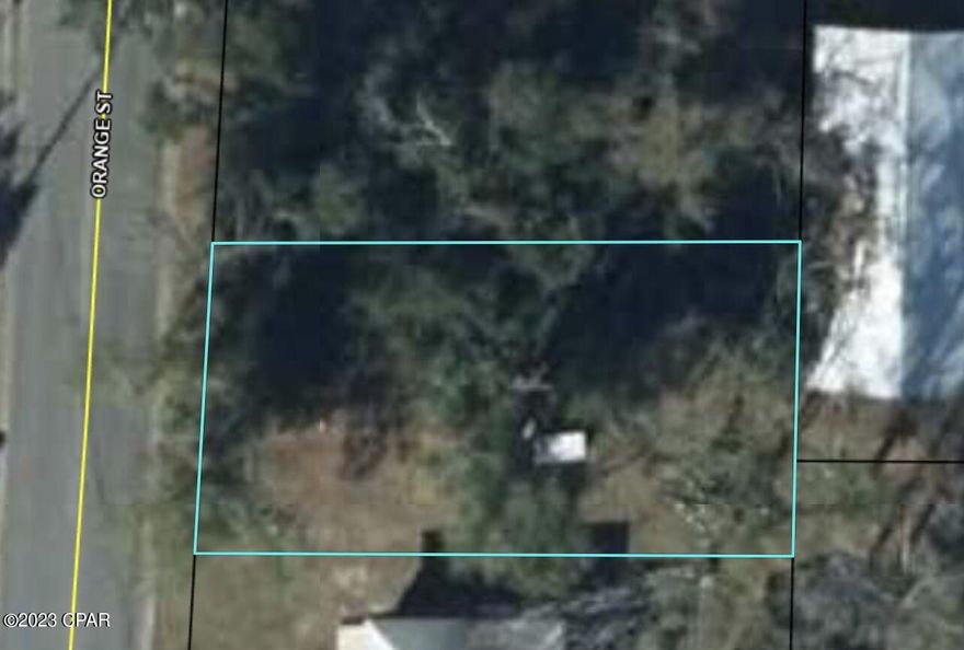 Own a lot on a busy street.  Wooded. Paved road frontage of 55 ft.  Many possibilities.  Bring all offers.