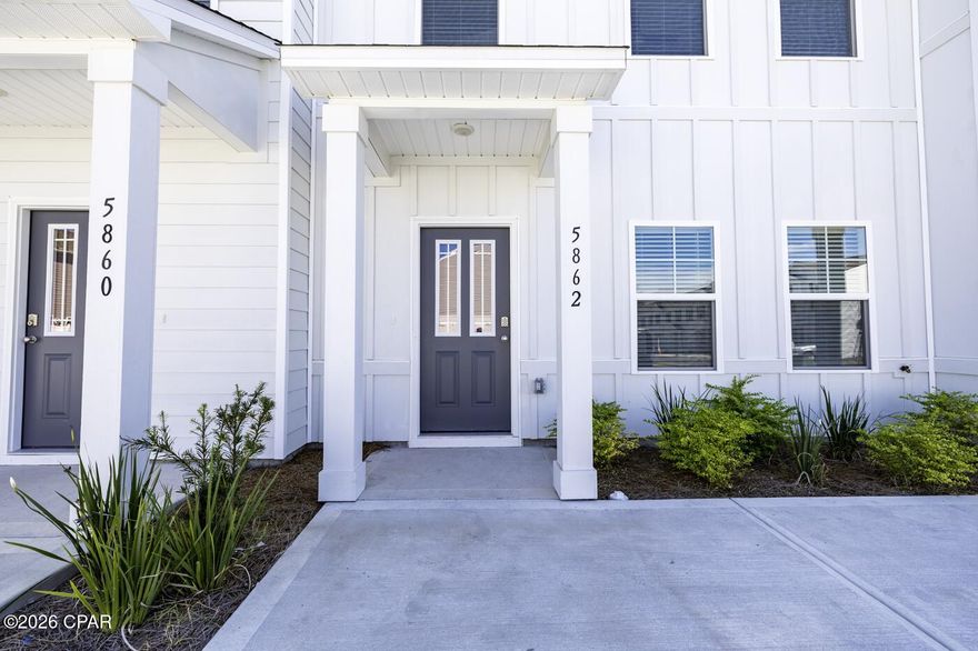 ***LEAST EXPENSIVE MOVE IN READY TOWNHOME IN TYNDALL STATION AS OF LIST DATE...NO NEED TO WAIT FOR UNIT TO BE BUILT!!*** This newly constructed townhome is perfectly located. You are less than 15 minutes from Tyndall AFB, and no more than a half an hour drive to the beautiful white sands and emerald waters of Panama City Beach and all of the entertainment, shopping, and restaurants it has to offer. Sellers spared no expense in updating this meticulous home. There is a downstairs bedroom and bathroom that could be used as the master. Upgrades include but are not limited to:Stainless steel appliances, quartz countertops throughout, ceiling fans in all rooms, 9 foot tray ceilings, hardie board siding, vinyl plank flooring downstairs and upgraded carpeted bedrooms, and dual sinks in master bathroom. The community features a dog park ideal for your fur babies, and makes for a great place to meet your neighbors. Hurry up and call me before this beautiful unit gets away!! All information is approximate and should be verified by buyers if important