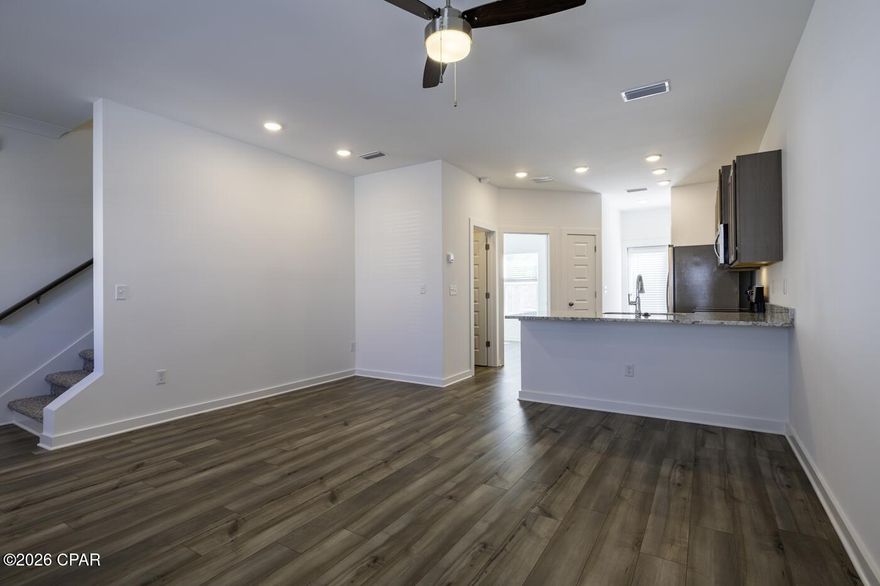 ***LEAST EXPENSIVE MOVE IN READY TOWNHOME IN TYNDALL STATION AS OF LIST DATE...NO NEED TO WAIT FOR UNIT TO BE BUILT!!*** This newly constructed townhome is perfectly located. You are less than 15 minutes from Tyndall AFB, and no more than a half an hour drive to the beautiful white sands and emerald waters of Panama City Beach and all of the entertainment, shopping, and restaurants it has to offer. Sellers spared no expense in updating this meticulous home. Upgrades include but are not limited to:Stainless steel appliances, quartz countertops throughout, ceiling fans in all rooms, 9 foot tray ceilings, hardie board siding, vinyl plank flooring downstairs and upgraded carpeted bedrooms, and dual sinks in master bathroom. The community features a dog park ideal for your fur babies, and makes for a great place to meet your neighbors. Hurry up and call me before this beautiful unit gets away!! All information is approximate and should be verified by buyers if important