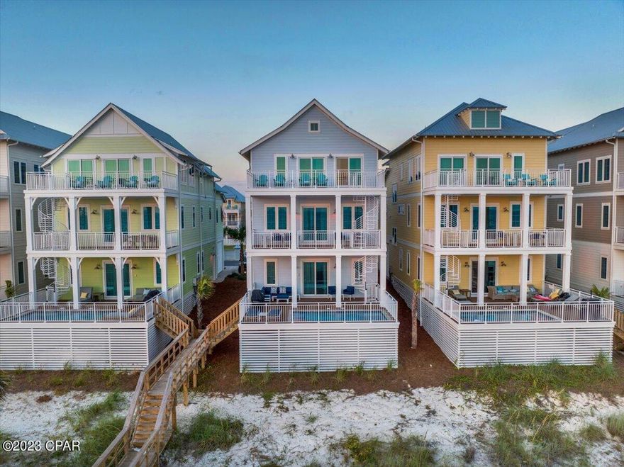 Back on the Market, unit was off so the developer could finish punch outs.  BRAND NEW, NEVER RENTED  Enjoy your time at PCB's Margaritaville Resort in one of the Best Gulf Front Luxury Beach House in the Resort.  Unit 4 has the Best Gulf Views and as well easy access from Front Beach Road but that's not all, This unit was customized by the owners with a different furniture package and decor to make it special. The Oasis Floor Plan features offers 3784 SF of living space with an endless view from the balconies on each floor with Two Master suites on the Third Floor.  The First Floor offers a Recreation Room with Mini-Kitchen, and a with a gaming area with Pool Table, Bunk Room and an Elevator as well as entry to the oversize deck featuring a Private Pool, oversize deck with Grill & a Private Beach walkover with outside shower.  The second floor features the living area with an open Great Room that opens to an oversize balcony with endless views East and West, Two Bedrooms with Ensuite Baths and a large laundry with additional storage.  The Third Floor offers three bedrooms, all with ensuite baths, with two being master bedrooms on the Gulf side with endless views of the coastline of PCB. All this with the amenities of Margaritaville PCB Resort including, The Salty Rim Bar & Grill, Fins Restaurant and Bar, (opens in 2024), and a 425-foot lazy rive Lagoon Pool that is Margaritaville's signature at each of their Resorts.  Get ready for good times as it's 5 o'clock somewhere at Margaritaville Resort.