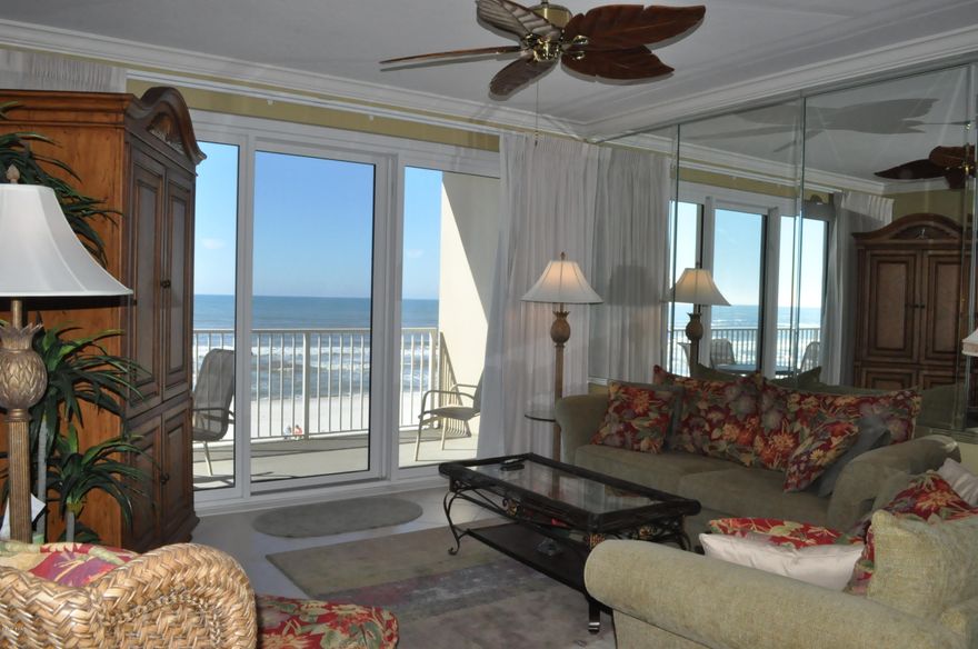 Enjoy an amazing view of the Gulf of Mexico from the private balcony of this Grandview East condo.  This is a 3BR/2BA unit located on the 2nd floor and it has never been on the rental program.  Professionally decorated, this condo comes fully furnished with everything you need for a luxury vacation getaway.  Along with the gorgeous view, additional features include granite countertops in the kitchen, a large laundry room, double vanities in the master bath along with a Jacuzzi tub and separate walk-in shower.  Grandview East facilities include a large fitness center, a private pool, beach access and coded entry to the building and amenities.  The Grandview East building has been completely updated with new railings, windows, doors and stucco, so while the actual year built is 2005, (more) the effective age 2016!  The condo association has recently bought land across the street to build a covered parking structure.  All info is approx. and must be verified by Buyers if important.