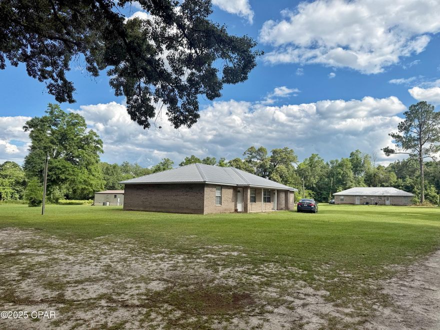 Prime 5.9 acre Multi-Family Investment Opportunity North of Marianna, FL!

Don't miss this outstanding income-producing property located just north of Marianna on paved Lynch Drive. This multi-family setup features two brick duplexes and one 1989 mobile home, totaling five rental units.

Each duplex unit offers 2 bedrooms and 1 bath, with new roofs installed in 2019—a solid, low-maintenance investment. The mobile home adds even more value with 3 bedrooms and 2 baths. All units are currently rented, providing consistent cash flow from day one.

According to Jackson County Planning & Zoning, the property allows for 2 units per acre, making future development a possibility. Plus, the current owner has already installed two additional water hookups that are not yet in use—perfect for potential expansion.

This well-maintained property is an excellent addition to any investment portfolio. Take advantage of this rare opportunity to own a versatile, income-generating asset in a desirable location. Contact us today to learn more and schedule a tour!