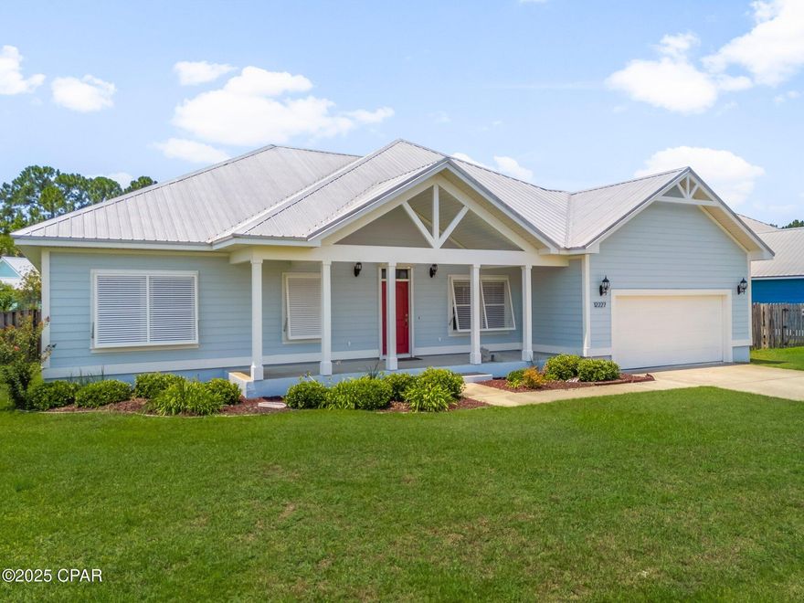 4BR/3BA Plantation-Style Home on One of the Largest Lots in the Neighborhood!

Welcome to this stunning 4-bedroom, 3-bath, 2,250 sq. ft. home located just two miles from Pier Park and minutes from the beach, nestled in a quiet subdivision off PCB Parkway. Originally built in 2011, this home has been meticulously maintained—with a brand new HVAC system and water heater installed just two months ago.

Step through the inviting covered front porch into a spacious foyer and into the expansive 18' x 22' great room, complete with soaring 11' ceilings, crown molding, recessed lighting, and plantation shutters throughout. The open-concept design flows seamlessly into a beautifully appointed kitchen featuring solid wood cabinetry, granite countertops, stainless steel energy-efficient appliances, including a natural gas stove, a large island breakfast bar with pendant lighting, and a walk-in pantry.

The luxurious primary suite offers crown molding, recessed lighting, and an elegant ensuite bath with a tiled walk-in shower, relaxing garden tub, and double vanity. A dedicated guest suite with its own private bath and walk-in closet provides comfort and privacy for visitors.

Enjoy year-round outdoor living on the covered 25' x 11' rear patio, ideal for entertaining or relaxing in the shade. The oversized double garage offers ample space for vehicles and storage, while the fully landscaped yard is easy to maintain with a built-in sprinkler system.

Bonus Features:

Brand new HVAC system (2025)
Brand new water heater (2025)
Large storage building added in the backyard
One of the largest lots in the subdivision
Durable metal roof
Low-maintenance Hardie board siding

This home offers the perfect blend of space, craftsmanship, and location—just minutes from shopping, dining, and Gulf beaches. Schedule your private showing today!