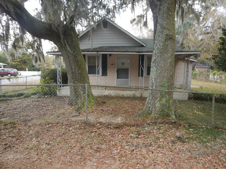 Handyman Special 3/1.5 home situated on a large corner lot in East Bagdad. This 1,326 sq. ft. fixer upper is an excellent investment opportunity! Featuring a spacious living area with a cozy fireplace, a large eat-in kitchen with a pantry and ample cabinet space and a large master with additional fireplace. This property also features a large 2 car detached garage providing extra parking and storage. All Information recorded in the MLS is intended to be accurate but cannot be guaranteed, buyer advised to verify. Sold As-Is. Only cash/renovation loan offers with 0 day inspection period will be considered. Buyer should perform their due diligence/necessary inspections before submitting an offer.