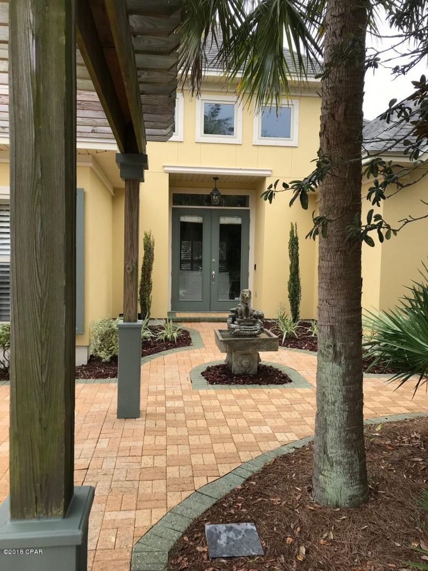 One of a kind Loft style beach house. 2x6 frame construction.  Lush landscaping, wood hurricane shutters, Paver driveway. Lanai with slate floor!  Fenced backyard with pavers.  Outdoor shower.  12x14 building with heat and a/c, tile floors, and a cedar closet.  Open floor plan with tile and bamboo flooring, granite counters, custom cabinetry, high ceilings, transom windows, plantation shutters, crown molding, bar with wine rack, Good Cents energy efficiency rating. 2nd floor balcony and a 3rd floor deck with gulf views! Offering a home warranty! All dimensions are to be verified by the Buyer/s.