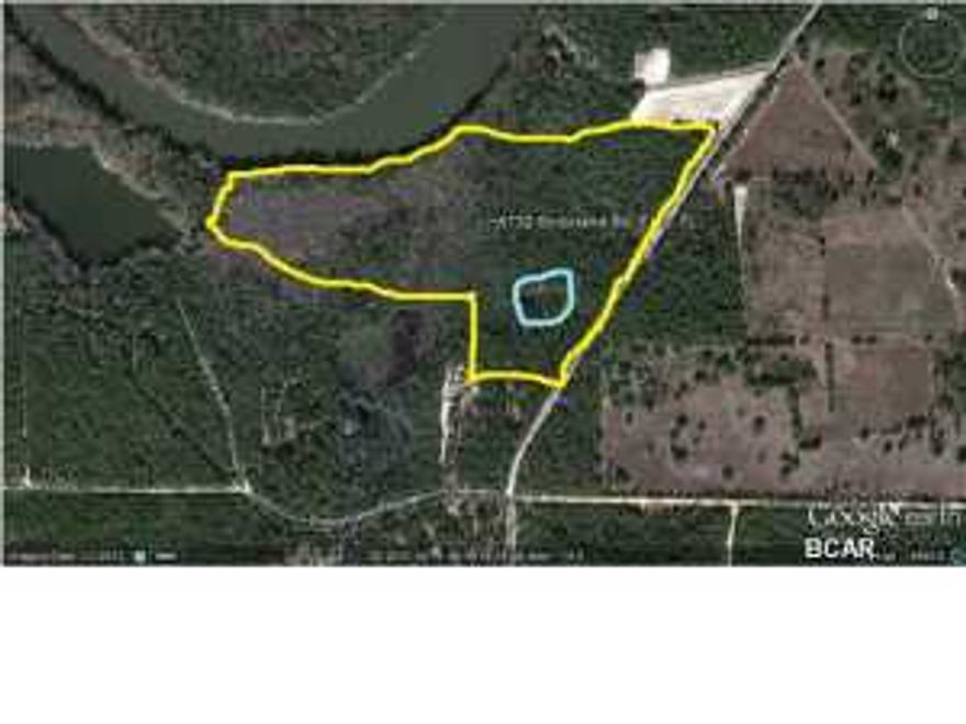 RARE FIND! 50 acres of RIVERFRONT property, just minutes from the new NWFL Beaches International Airport. This property has over 1200ft of riverbank and ~1700ft on Strickland Rd, a well maintained PAVED road in central Ebro area. This property has some magnificant hardwoods, and is mostly uplands with varying degrees of steep river banks which held back the flood in 2008. Property also features a CRYSTAL CLEAR SPRING in the center of the property, about the size of a large swimming pool, with a cool stream leading down to the river could be a focal point for development plans. Property is currently zoned as Timberland, but because of its location would make an excellent candidate for upzoning for residential or possibly commercial development. This property is one of very few  privatly owned properties along the Choctawhatchee River that can be developed. Seller will also consider owner financing with acceptable downpayment.