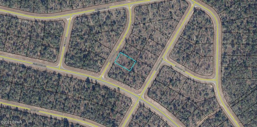 Nice level vacant wooded lot in Sunny Hills, priced to sell