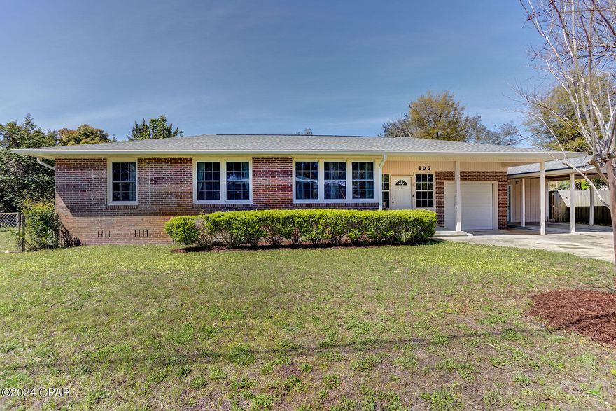 CURRENTLY UNDER CONTRACT, SELLER WILL CONSIDER BACKUP OFFERS Welcome to this timeless corner lot home in the heart of one of Panama City's oldest and most historic neighborhoods, the Cove. This lovingly maintained residence, built in 1951, offers three bedrooms, one bathroom, two bonus areas, a single-car garage, carport, PLUS a 546 sq foot detached workshop waiting for you to use your imagination for its use!

As you walk through the front door, you are greeted by an 11x24 grand entryway suitable for a large mudroom, a sitting room, kids' playroom, home office, or whatever you desire. To the left, you'll discover a warm and inviting living space with original hardwood floors. The adjacent dining area provides a lovely space to enjoy meals.

The kitchen is compact yet functional and offers a bonus space (use for Breakfast Nook, Pantry, Sitting Area, Craft Space, etc.) As you walk down the hallway, you will see the three bedrooms that are decently sized and all feature original hardwood flooring. The bathroom offers a lot of charm and has a bathtub/shower combo.

The attached garage is suitable for one car or can be used as extra storage space and houses the laundry area. The detached workshop with power is ready for all your DIY projects or put the finishing touches on it to make it your own Man Cave or She Shed, or with plumbing, it could become a mother-in-law suite or rental-producing unit with its private entry.

Out the back door, as you step onto the XL 600 sqft patio area, you enter your private retreat. The spacious yard offers endless possibilities for outdoor enjoyment, and a bonus-the side yard is fenced off separately.

Located in one of the most desirable historic neighborhoods, this home is in close proximity to shopping, Ascension Sacred Heart Hospital, and all that Panama City has to offer. Don't miss out on this rare opportunity to own a piece of history with modern conveniences.