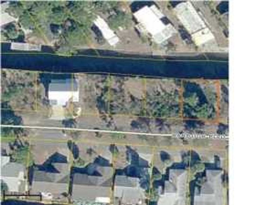 Very nice building lot located in a gated community. This 50x70 lot is directly located on a canal that leads to the bay. Imagine the possibilities of building your dream home here! Location is perfect, close to shopping, schools, restaurants, Navy Base and right on the water! There are 4 lots total available!