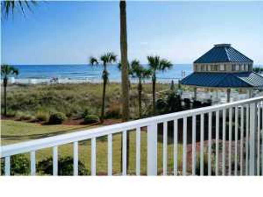 This second floor unit is in the E building of Dunes of Panama. The views from this unit are spectacular. You balcony looks on to the ocean while catching a side view to the pool. This resort property contains five condominiums covering over 1500 of beach frontage. The resort includes an onsite market, tennis courts, and plenty of parking. There is tile throughout the living room. The floor plan is open and make good use of space.