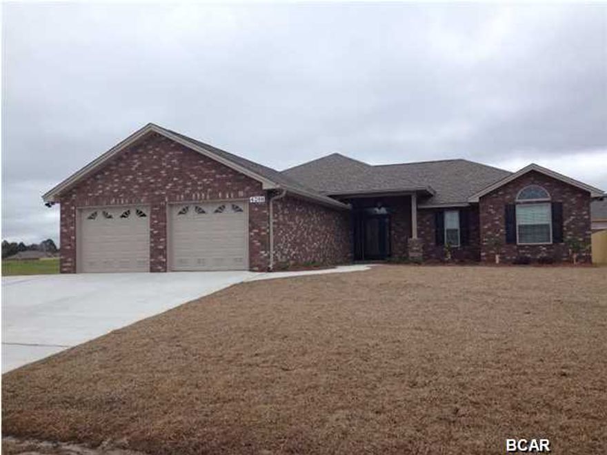 This fine Built Home by locally renowned builder is 3 bedroom 2 bath all brick home that offers master bath with his & hers double shower with rain maker (3 heads)and shower seats on both ends and very large walk in closet. The kitchen is a dream with all wood cabinets, solid surface countertops, and stainless steel appliances. There are cabinets in the laundry room. Living room with and electric fire place and crown molding. Home comes with a security system and generator ready electrical outlet with cord. Outdoors there's a screen patio, outside shower and sprinkler system. Home is built to 140 MPH wind code. Located at Bylsma Manor Estates with many homes already built and waiting for you to tour today. Ask about No Money Down. If important measurements should be verified