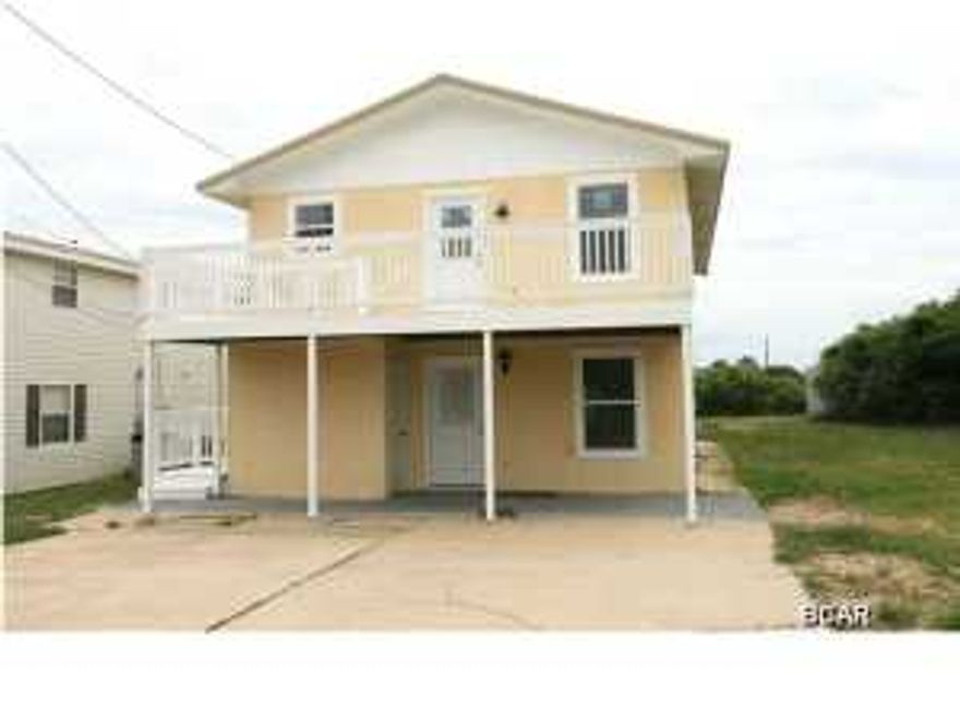 GREAT INVESTMENT OPPORTUNITY... With Gulf Views. A Rare Duplex opportunity on the west end of Panama City Beach. Live in one and generate income from the other, or rent them both. Recently updated with all new windows and a complete exterior paint. This one is ready to go!!! the lot has adequate room for a future swimming pool!!! The storage building in the backyard is included.
