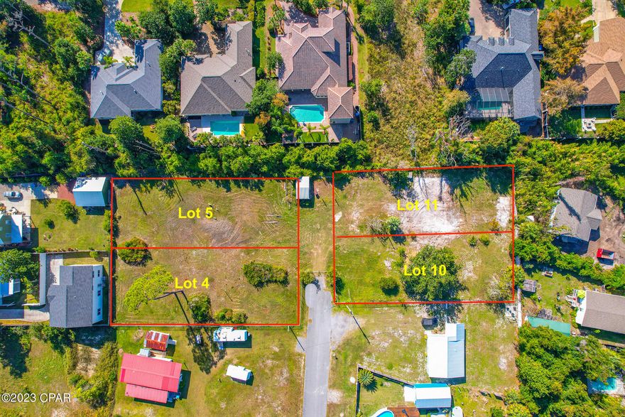 Great Panama City Beach location, with opportunity to build 1 or 2  homes with St. Andrews Bay View from 2nd or 3rd story. This is a .21 Acre level parcel, with 3 other surrounding parcels available for purchase.  The lot is cleared and located only 1 street away from St. Andrews Bay waterfront homes. Survey available, city water available. (Info is approx.  Buyer to verify anything that is important.)