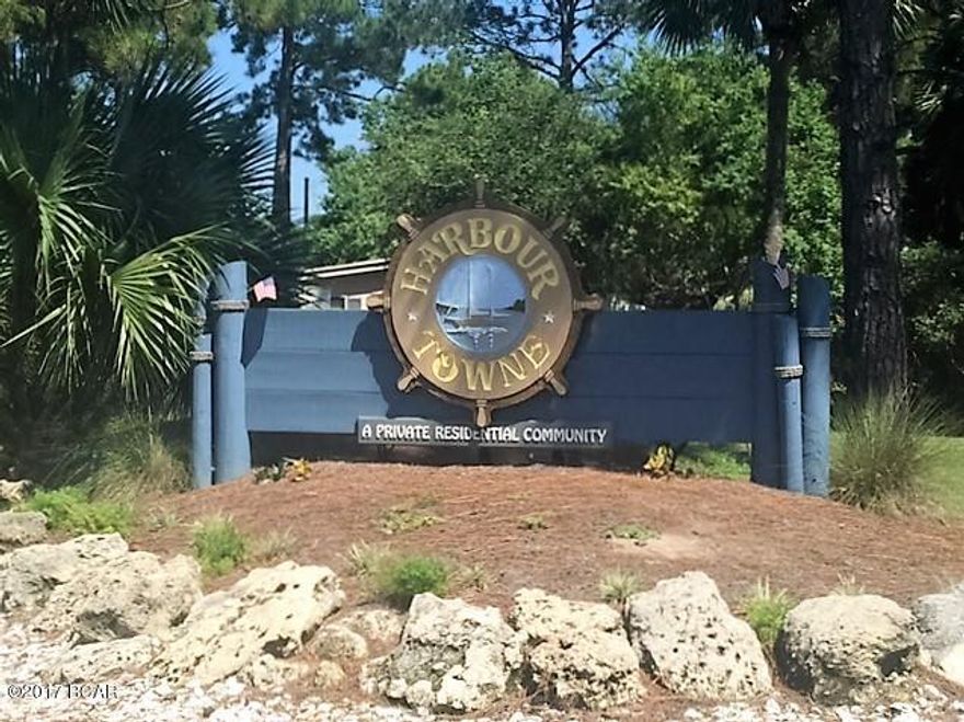 COMP PURPOSES:  WATERFRONT in the gated community of Harbour Towne.  Quick access to the bay and out into the gulf.  Gated community with low HOA fees which include pools, tennis court, security gates, trash pickup and yard maintenance.