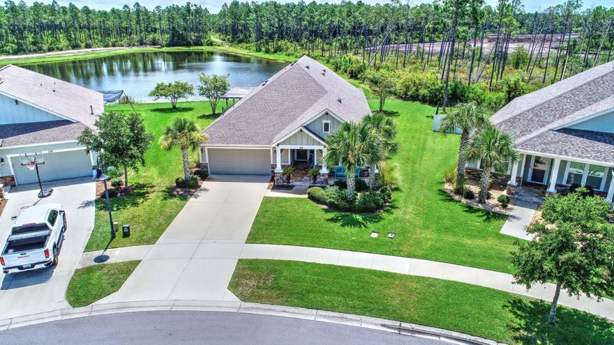 USE The BONUS as a 5th bedroom! Welcome to the DAVID WEEKLEY'S popular ''SKYVIEW'' Plan, a Craftsman style 3199 square ft home on a PREMIUM lot in popular Breakfast Point. This impressive plan ALSO features a wonderful waterfront view of a pond.  You will fall in love with the details on the front porch and the back patio but wait until you enter the home! There is a wide hall that shows the roominess of the home. It has a guest bedroom and bath up front so your guests will feel their privacy.  There is a recreation room that is used currently for a piano enthusiast. The room intended for dining was turned into a Library and there are 2 other bedrooms with a full bath.  Upstairs is  Bonus area &1/2 bath- (The Master has a water view & is near the kitchen) See it and you are sure to want it!